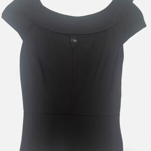 White and blaxk mod top